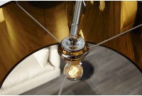 Lampadaire design en métal noir avec abat-jour noir et doré