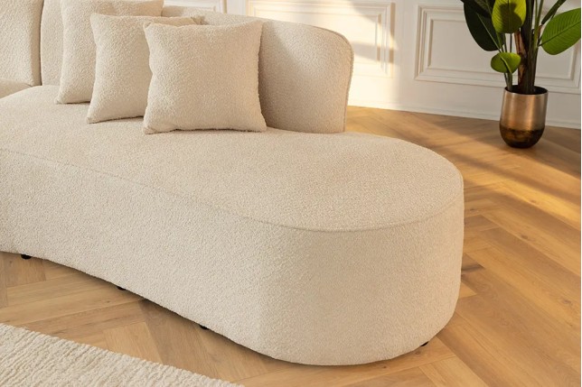 Canapé XXL ATELIER L 330 cm en tissu bouclé beige – Grand sofa moderne 4 places avec coussins inclus