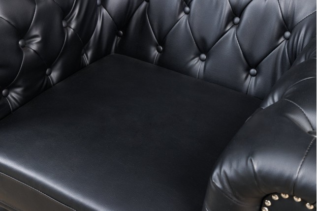 Fauteuil Chesterfield cuir synthétique noir vieilli