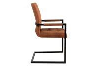 Chaise accoudoir cantilever capitonnées coloris Oxford  cognac