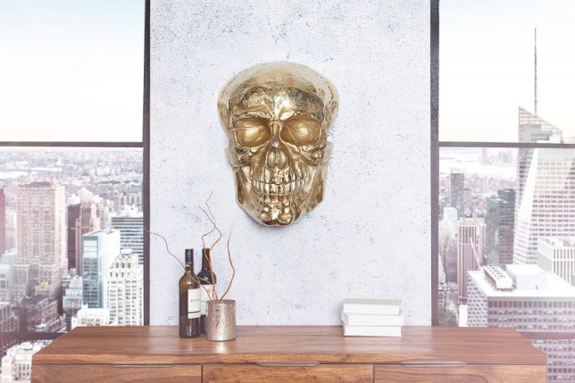 Sculpture murale design crâne humain en aluminium coloris doré
