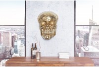 Sculpture murale design crâne humain en aluminium coloris doré