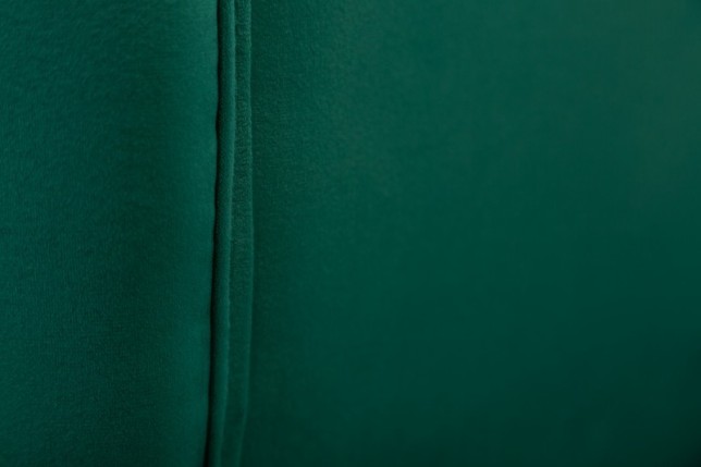 Fauteuil en velours coloris vert émeraude